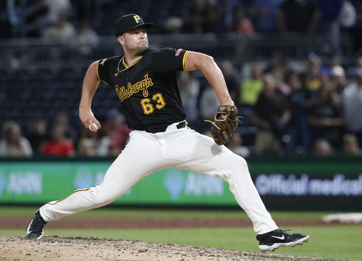 Aug 22, 2024; Pittsburgh, Pennsylvania, USA;  Pittsburgh Pirates relief pitcher Hunter Stratton (63) pitches against the Cincinnati Reds during the ninth inning at PNC Park. Mandatory Credit: Charles LeClaire-USA TODAY Sports