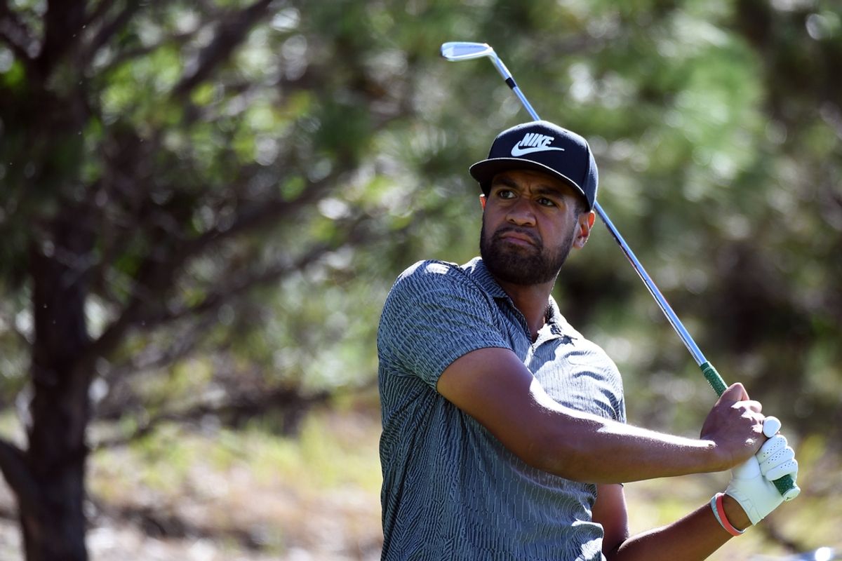 Aug 23, 2024; Castle Rock, Colorado, USA; Tony Finau watches his tee shot on the seventh hole during the second round of the BMW Championship golf tournament at Castle Pines Golf Club. Mandatory Credit: Christopher Hanewinckel-Imagn Images