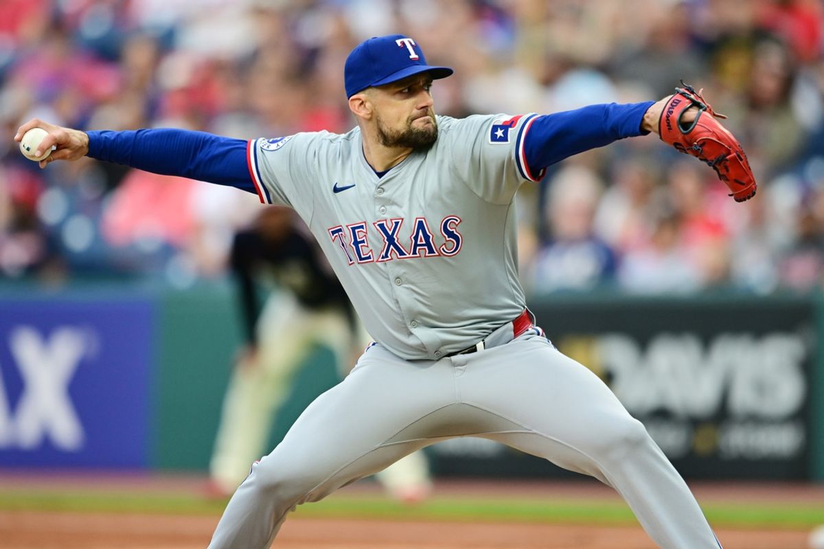 Aug 23, 2024; Cleveland, Ohio, USA; Texas Rangers starting pitcher Nathan Eovaldi (17) throws a pitch during the first inning against the Cleveland Guardians at Progressive Field. Mandatory Credit: Ken Blaze-Imagn Images