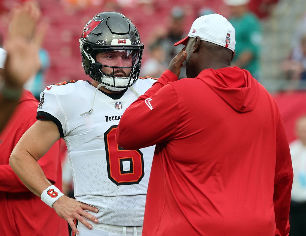 Aug 23, 2024; Tampa, Florida, USA;  Tampa Bay Buccaneers head coach Todd Bowles talks with quarterback Baker Mayfield (6) at Raymond James Stadium. Mandatory Credit: Kim Klement Neitzel-Imagn Images