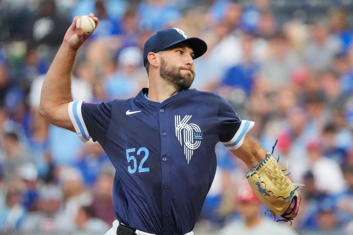 Aug 23, 2024; Kansas City, Missouri, USA; Kansas City Royals starting pitcher Michael Wacha (52) delivers a pitch against the Philadelphia Phillies in the first inning at Kauffman Stadium. Mandatory Credit: Denny Medley-USA TODAY Sports