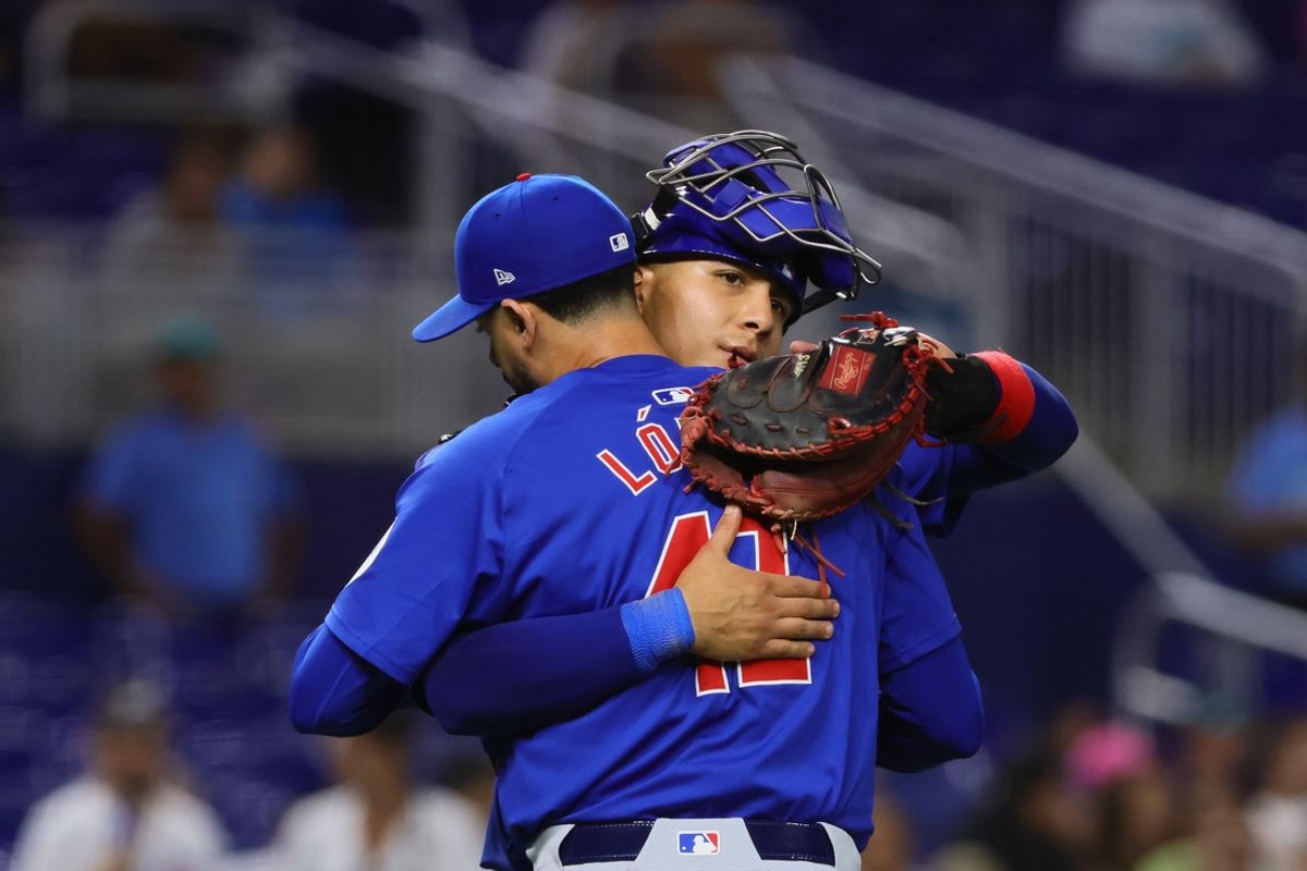 Aug 23, 2024; Miami, Florida, USA; Chicago Cubs catcher Miguel Amaya (9) celebrates with relief pitcher Jorge Lopez (41) after the game against the Miami Marlins at loanDepot Park. Mandatory Credit: Sam Navarro-Imagn Images