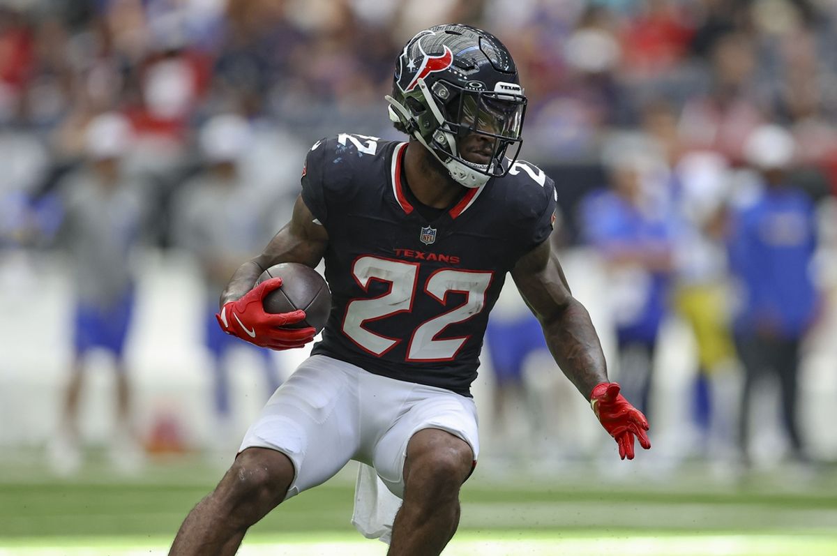 Houston Texans running back Cam Akers (22) runs with the ball during the first quarter against the Los Angeles Rams at NRG Stadium. Mandatory Credit: Troy Taormina-Imagn Images