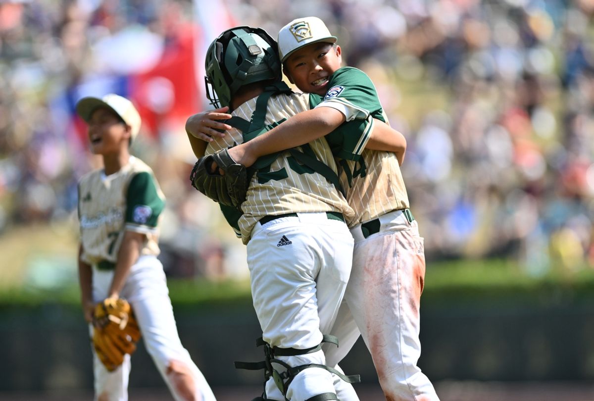 Aug 24, 2024; Williamsport, PA, USA; Asia-Pacific Region pitcher Chiu Wei-Che (14) reacts with Asia-Pacific Region catcher Yu Chia-Jui (23) after the game against Latin America Region at Lamade Stadium. Mandatory Credit: Kyle Ross-USA TODAY Sports