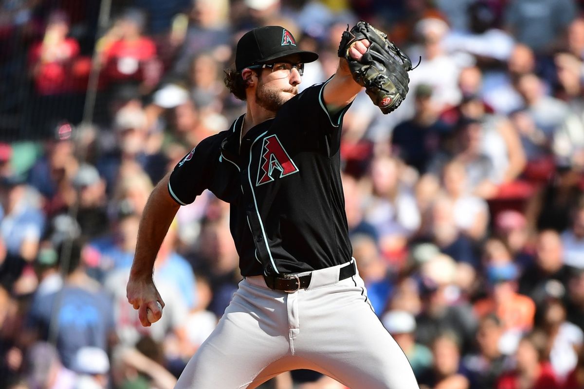 Aug 24, 2024; Boston, Massachusetts, USA;  Arizona Diamondbacks starting pitcher Zac Gallen (23) pitches during the second inning against the Boston Red Sox at Fenway Park. Mandatory Credit: Bob DeChiara-USA TODAY Sports
