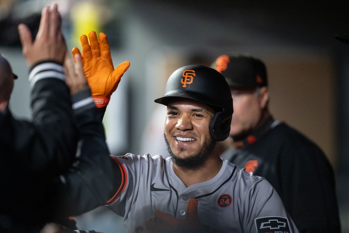 Aug 23, 2024; Seattle, Washington, USA; San Francisco Giants second baseman Thairo Estrada (39) celebrates in the dugout after scoring a run during the second inning against the Seattle Mariners at T-Mobile Park. Mandatory Credit: Stephen Brashear-USA TODAY Sports