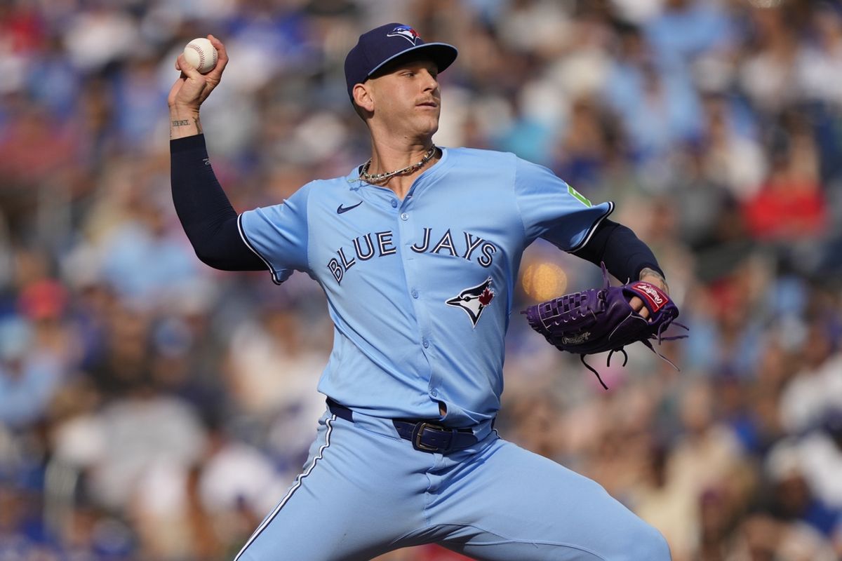 Aug 24, 2024; Toronto, Ontario, CAN; Toronto Blue Jays starting pitcher Bowden Francis (44) pitches to the Los Angeles Angels during the ninth inning at Rogers Centre. Mandatory Credit: John E. Sokolowski-USA TODAY Sports
