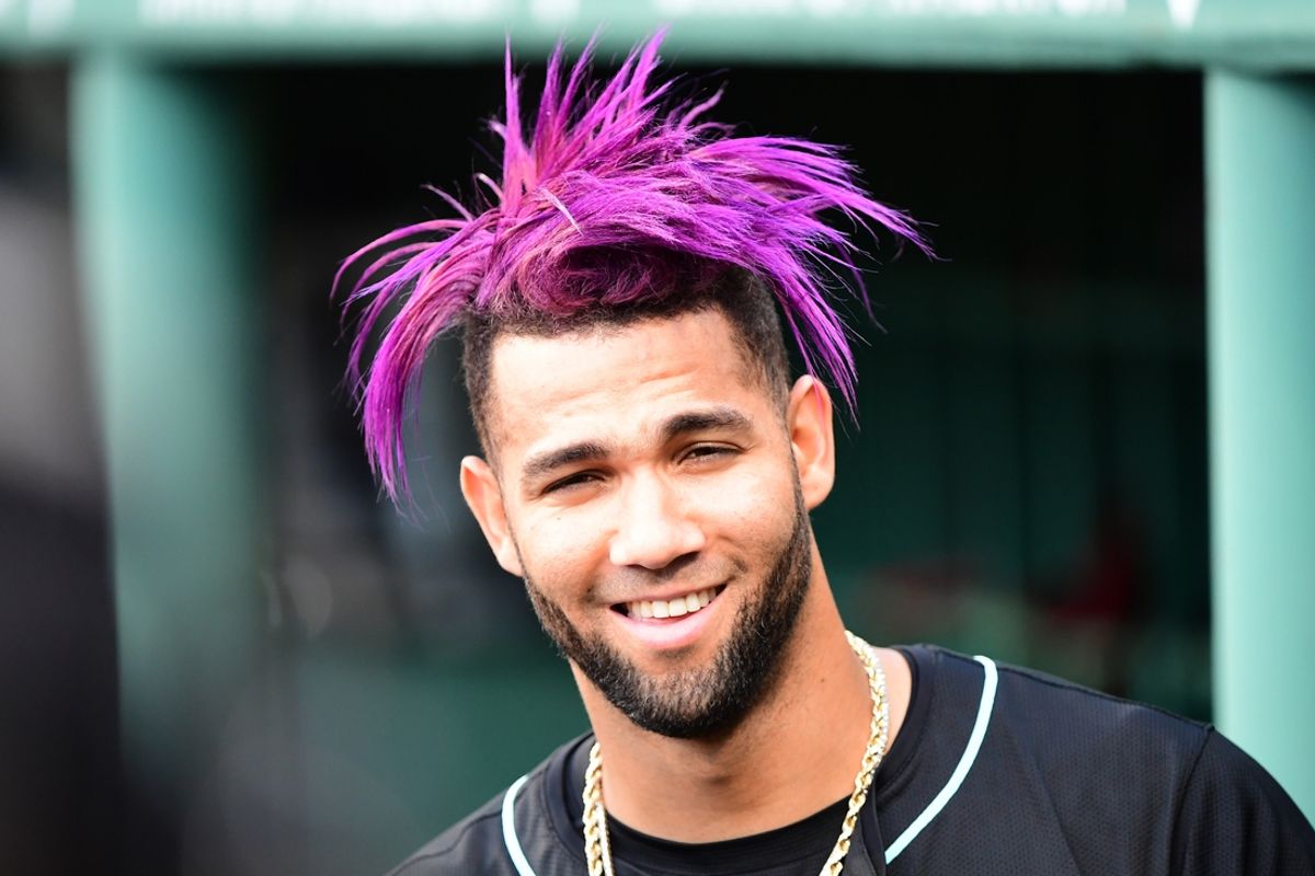 Aug 24, 2024; Boston, Massachusetts, USA;  Arizona Diamondbacks left fielder Lourdes Gurriel Jr. (12) in the dugout during the seventh inning against the Boston Red Sox at Fenway Park. Mandatory Credit: Bob DeChiara-Imagn Images