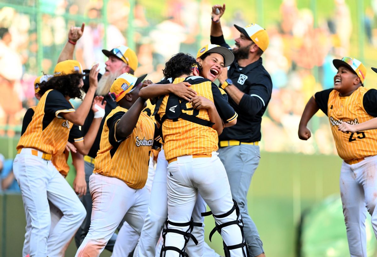 Aug 24, 2024; Williamsport, PA, USA; Southeast Region infielder James Feliciano (14) celebrates with catcher Landon Bono (19) after the game against Southwest Region at Lamade Stadium. Mandatory Credit: Kyle Ross-USA TODAY Sports