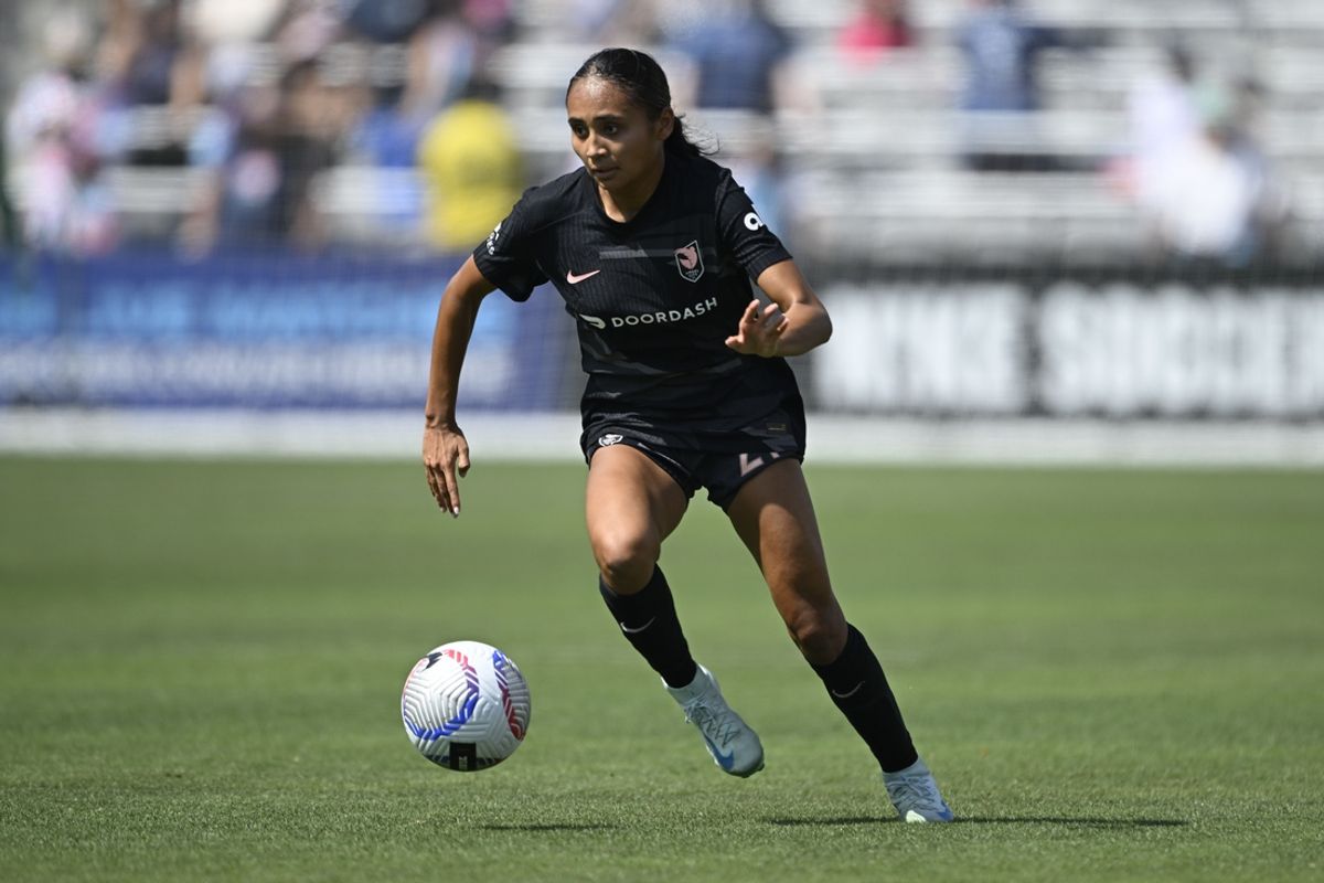 Aug 24, 2024; San Diego, California, USA; Angel City FC midfielder Alyssa Thompson (21) controls the ball against the San Diego Wave FC during the second half at Snapdragon Stadium. Mandatory Credit: Denis Poroy-USA TODAY Sports