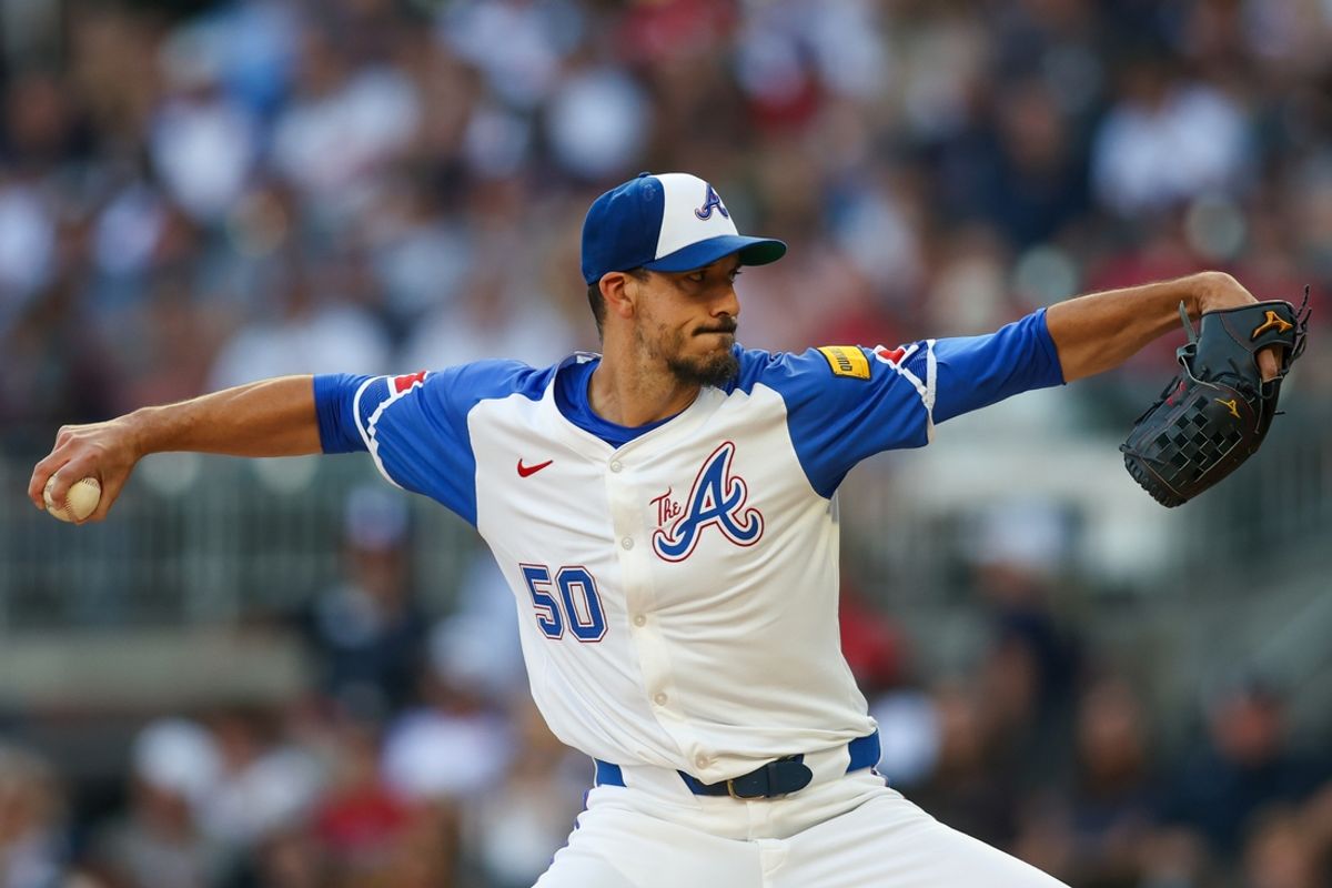 Aug 24, 2024; Atlanta, Georgia, USA; Atlanta Braves starting pitcher Charlie Morton (50) throws against the Washington Nationals in the first inning at Truist Park. Mandatory Credit: Brett Davis-USA TODAY Sports