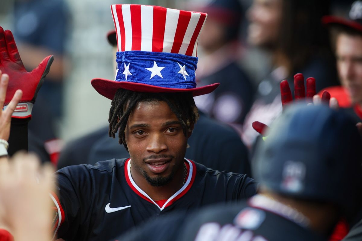 Aug 24, 2024; Atlanta, Georgia, USA; Washington Nationals third baseman Jose Tena (8) celebrates with teammates after a two-run home run against the Atlanta Braves in the second inning at Truist Park. Mandatory Credit: Brett Davis-USA TODAY Sports