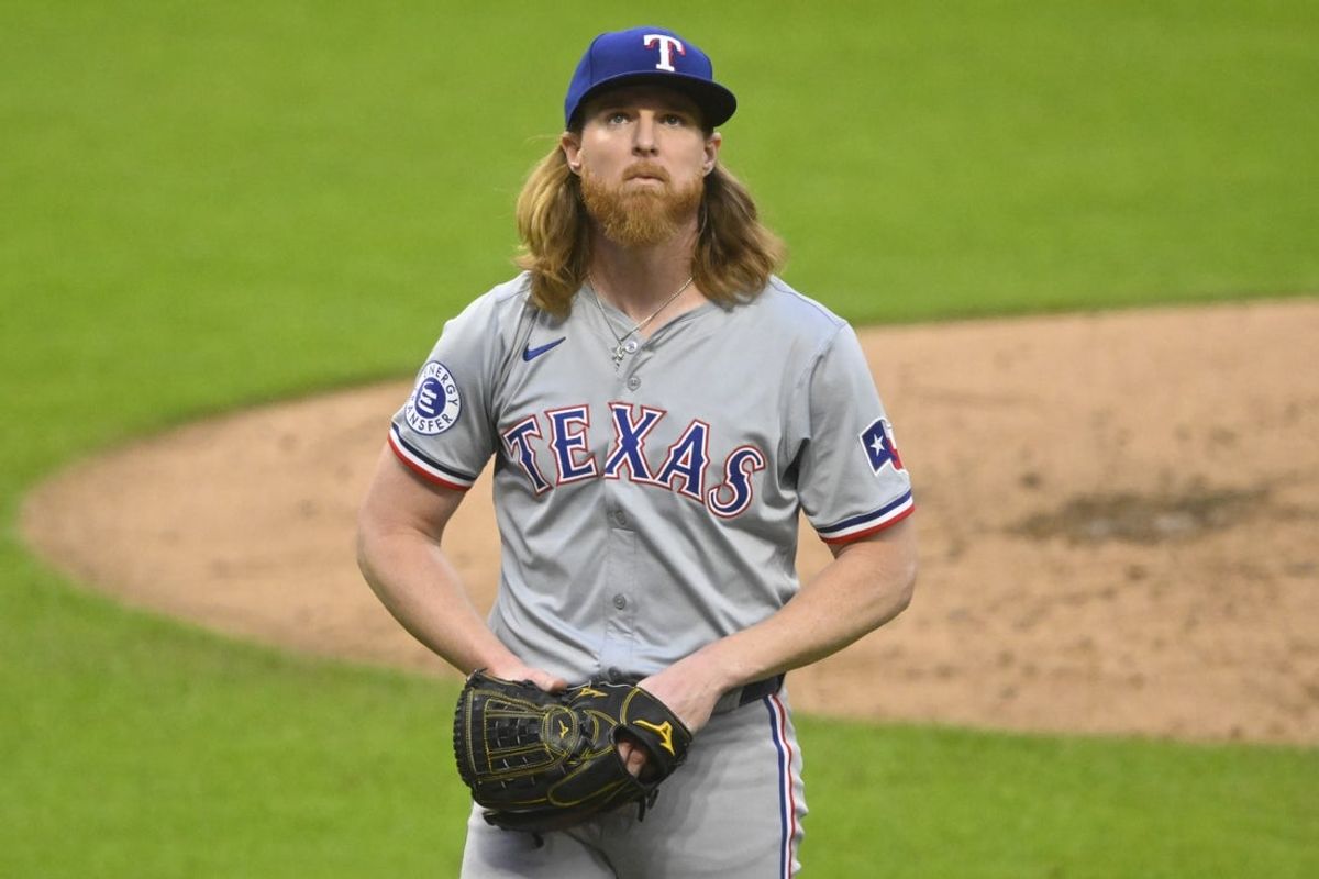 Aug 24, 2024; Cleveland, Ohio, USA; Texas Rangers starting pitcher Jon Gray (22) walks off the mound at the end of the second inning against the Cleveland Guardians at Progressive Field. Mandatory Credit: David Richard-Imagn Images