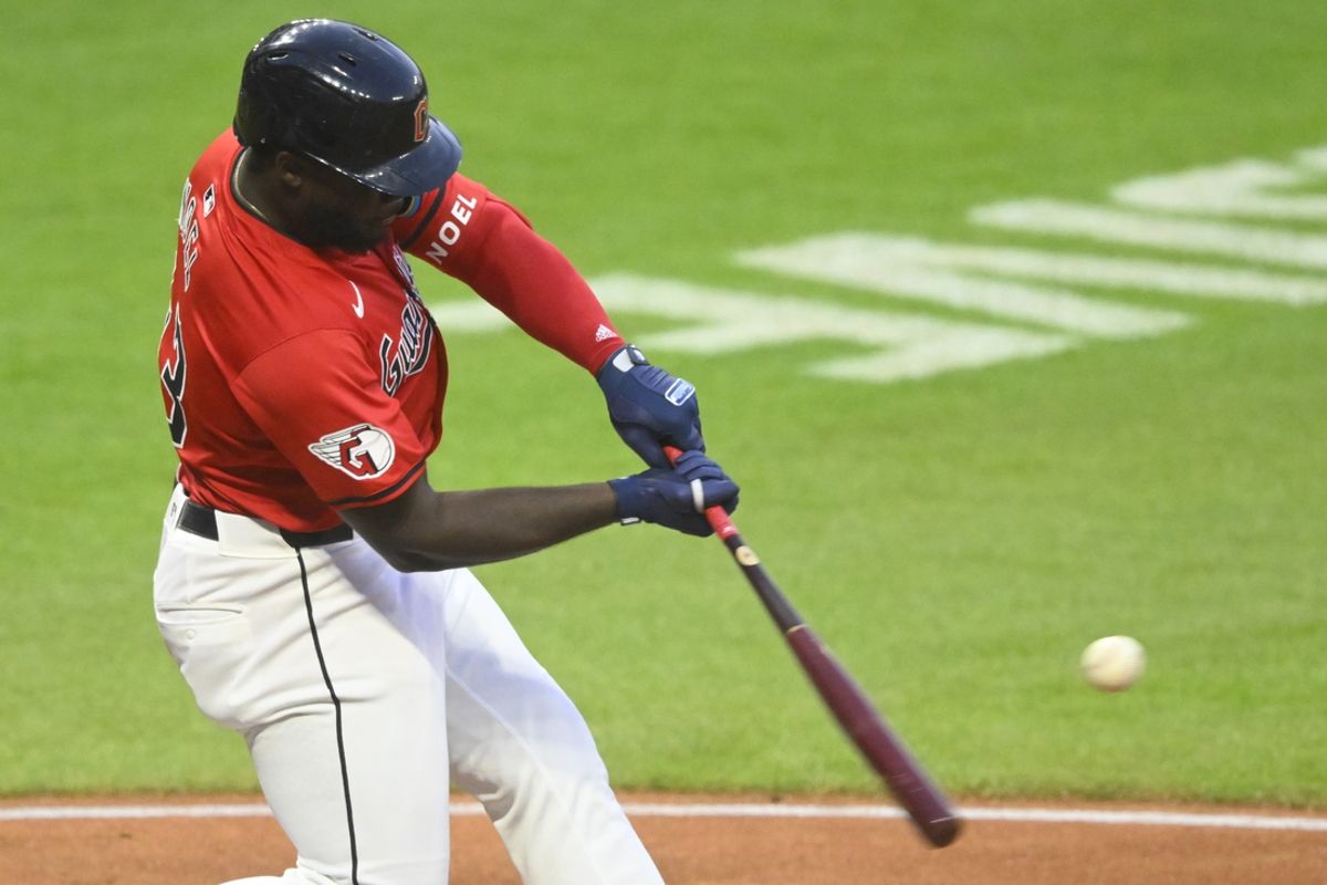 Aug 24, 2024; Cleveland, Ohio, USA; Cleveland Guardians right fielder Jhonkensy Noel (43) hits a two-run home run in the third inning against the Texas Rangers at Progressive Field. Mandatory Credit: David Richard-USA TODAY Sports