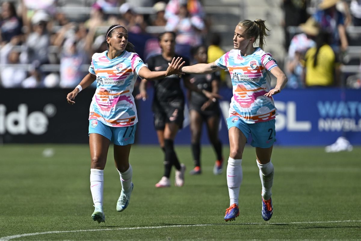 Aug 24, 2024; San Diego, California, USA; San Diego Wave FC defender Abby Dahlkemper (2) celebrates with forward Maria Sanchez (77) after scoring a goal against Angel City FC during the second half at Snapdragon Stadium. Mandatory Credit: Denis Poroy-USA TODAY Sports
