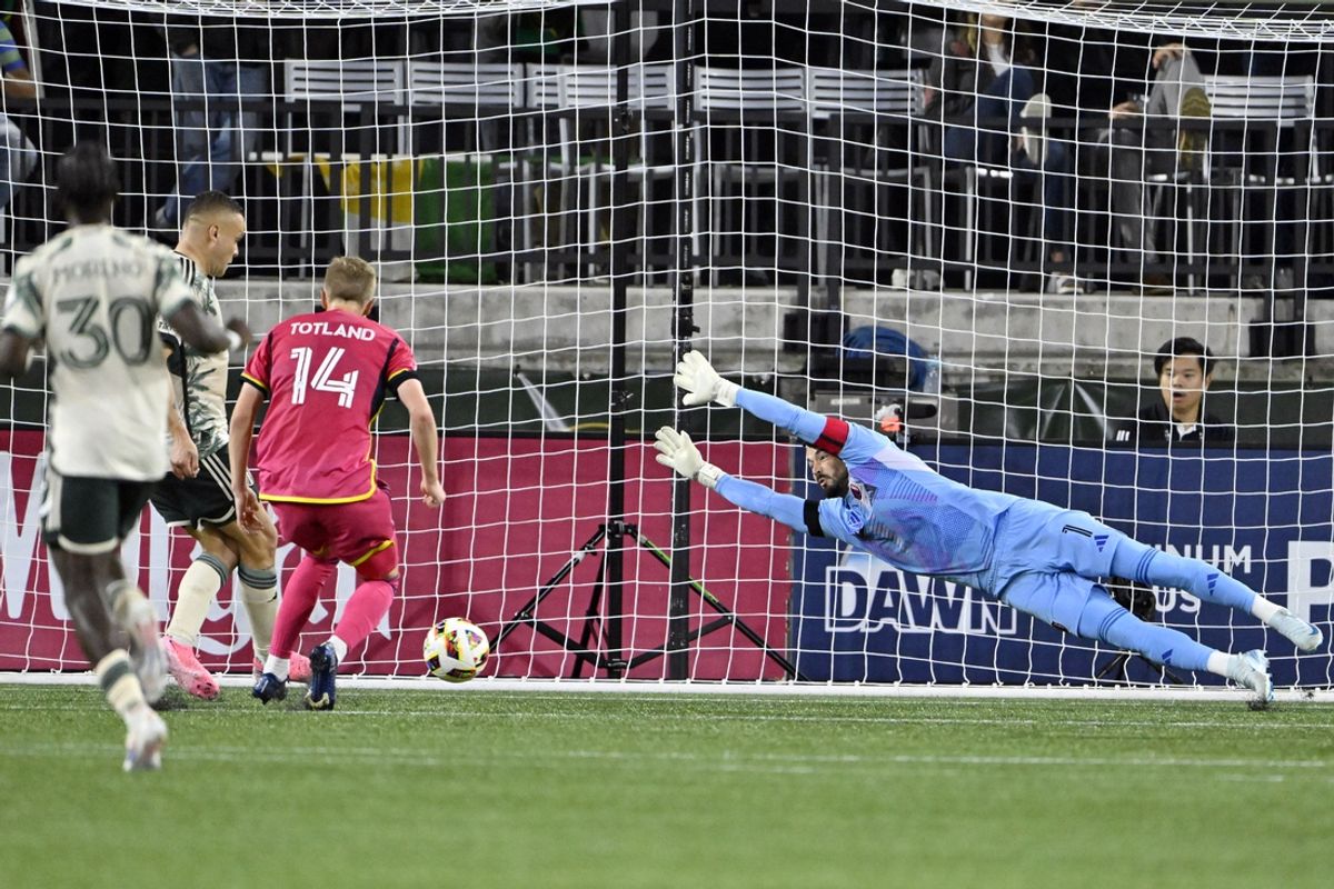 Aug 24, 2024; Portland, Oregon, USA; Portland Timbers forward Jonathan Rodriguez (14) scores a goal against St. Louis CITY SC goalkeeper Roman Burki (1) in the first half at Providence Park. Mandatory Credit: Troy Wayrynen-USA TODAY Sports