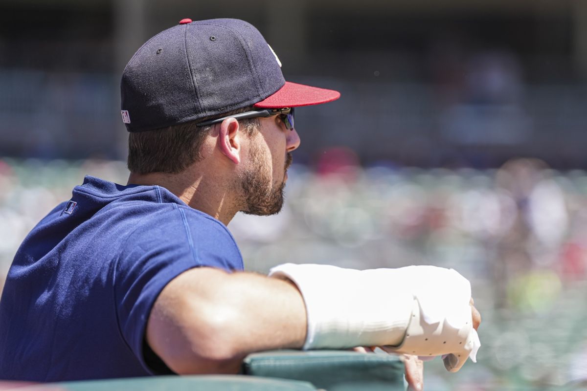 Aug 25, 2024; Cumberland, Georgia, USA; Atlanta Braves injured third baseman Austin Riley (27) shown in the dugout during the game against the Washington Nationals at Truist Park. Mandatory Credit: Dale Zanine-Imagn Images