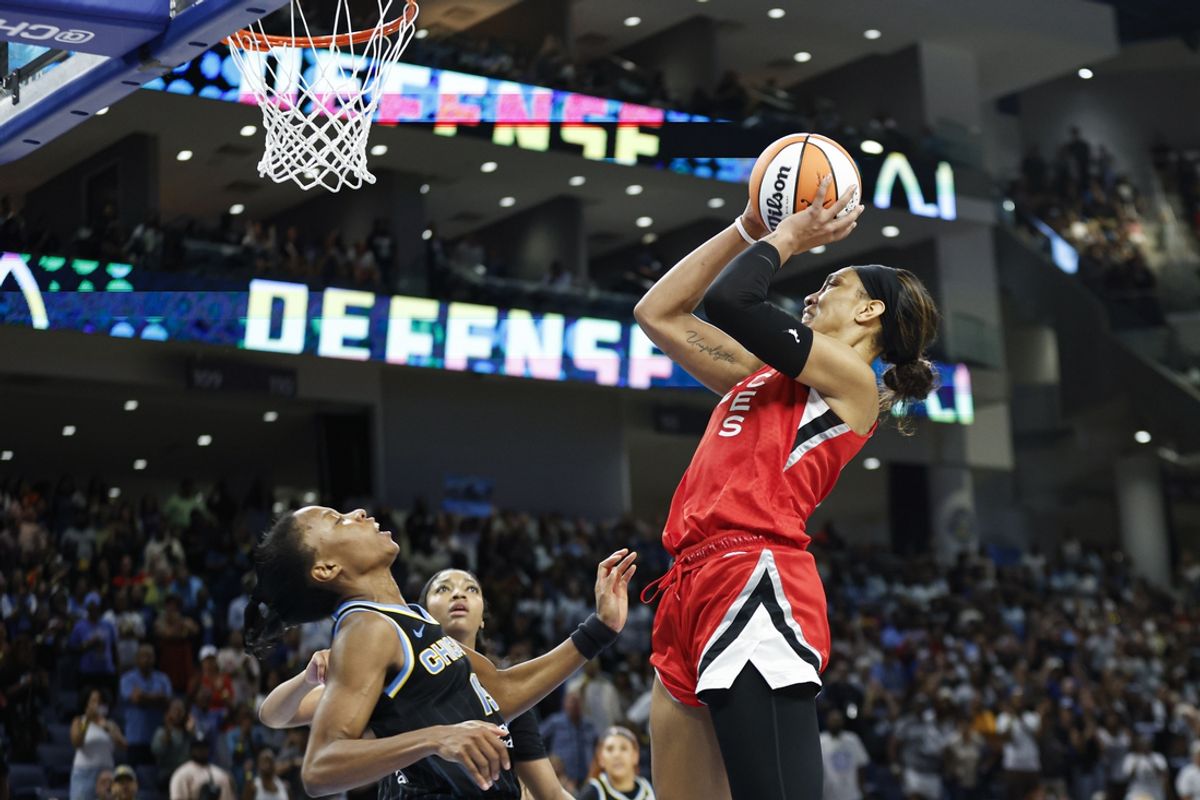 Aug 25, 2024; Chicago, Illinois, USA; Las Vegas Aces center A'ja Wilson (22) shoots and scores game winning basket against the Chicago Sky during the second half at Wintrust Arena. Mandatory Credit: Kamil Krzaczynski-USA TODAY Sports