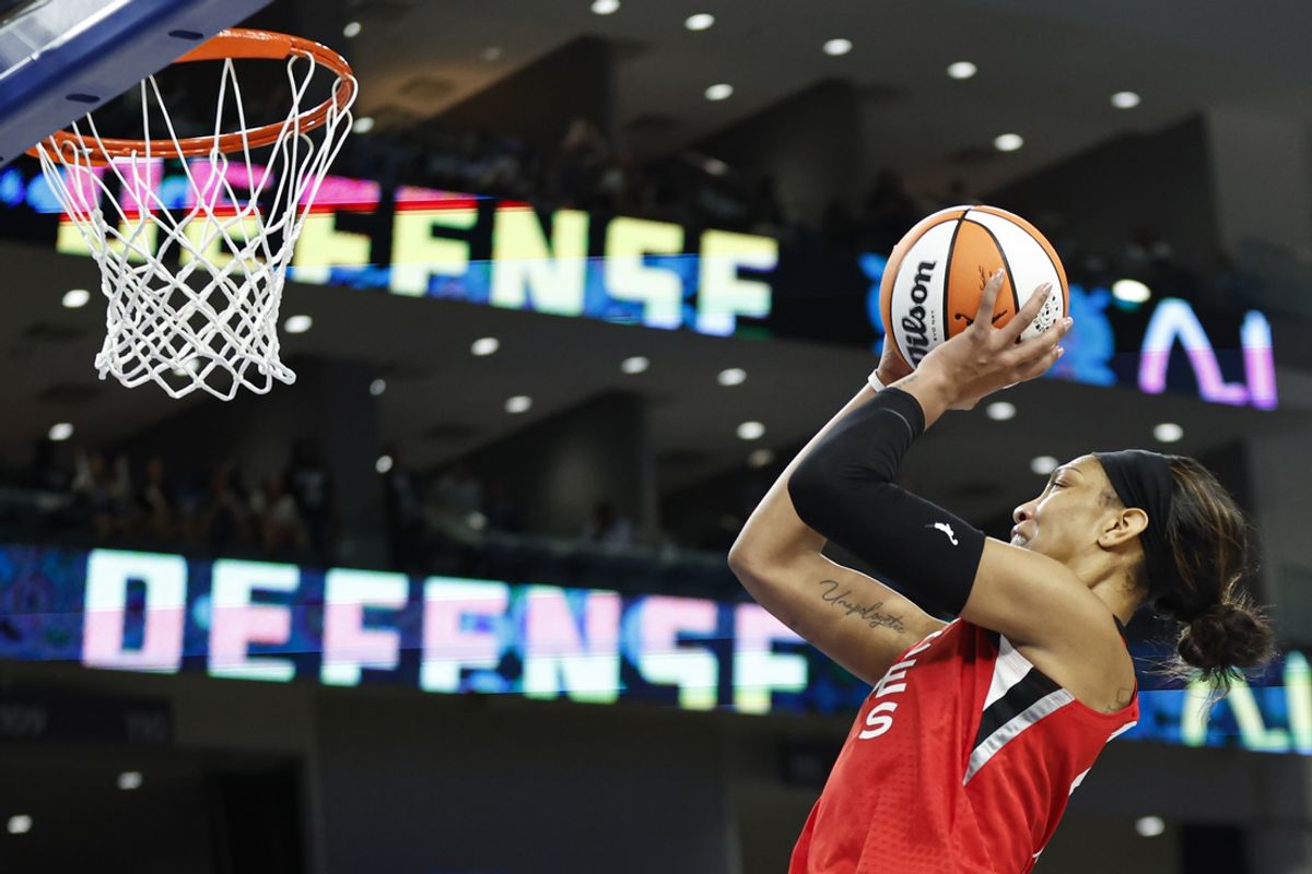 Aug 25, 2024; Chicago, Illinois, USA; Las Vegas Aces center A'ja Wilson (22) shoots and scores game winning basket against the Chicago Sky during the second half at Wintrust Arena. Mandatory Credit: Kamil Krzaczynski-Imagn Images