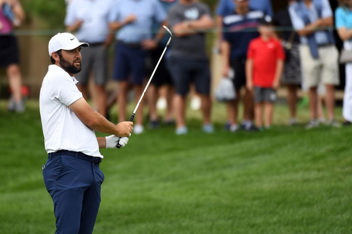Aug 25, 2024; Castle Rock, Colorado, USA; Scottie Scheffler hits a shot on the ninth hole during the final round of the BMW Championship golf tournament at Castle Pines Golf Club. Mandatory Credit: Christopher Hanewinckel-USA TODAY Sports