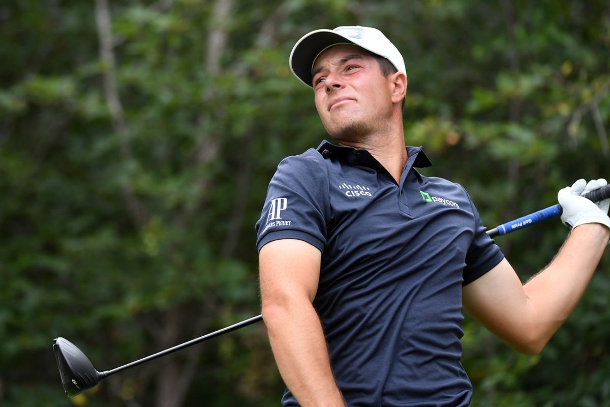 Aug 25, 2024; Castle Rock, Colorado, USA; Viktor Hovland hits his tee shot on the eighth hole during the final round of the BMW Championship golf tournament at Castle Pines Golf Club. Mandatory Credit: Christopher Hanewinckel-Imagn Images
