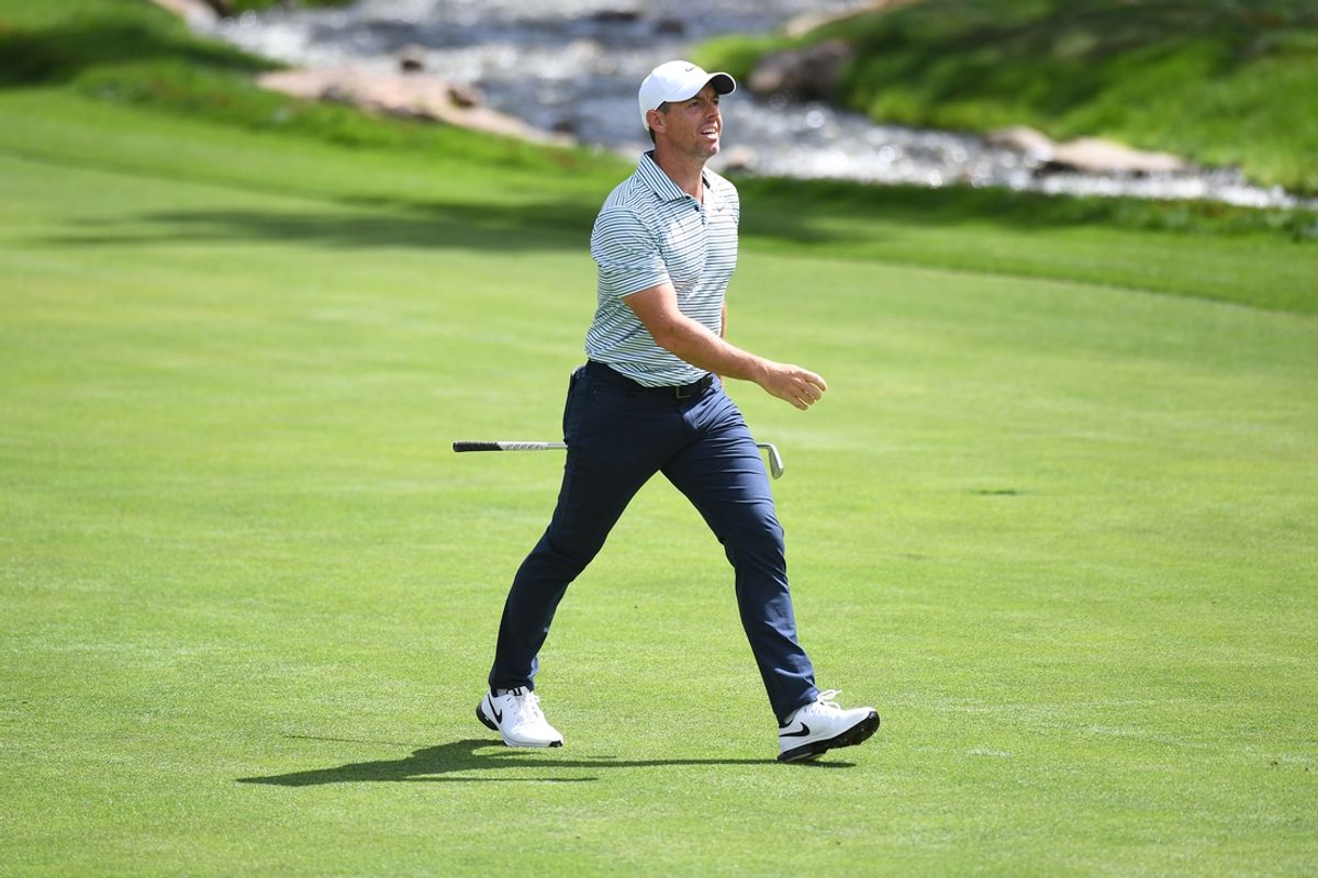 Aug 25, 2024; Castle Rock, Colorado, USA; Rory McIlroy after hitting his second shot on the 17th hole during the final round of the BMW Championship golf tournament at Castle Pines Golf Club. Mandatory Credit: Christopher Hanewinckel-Imagn Images