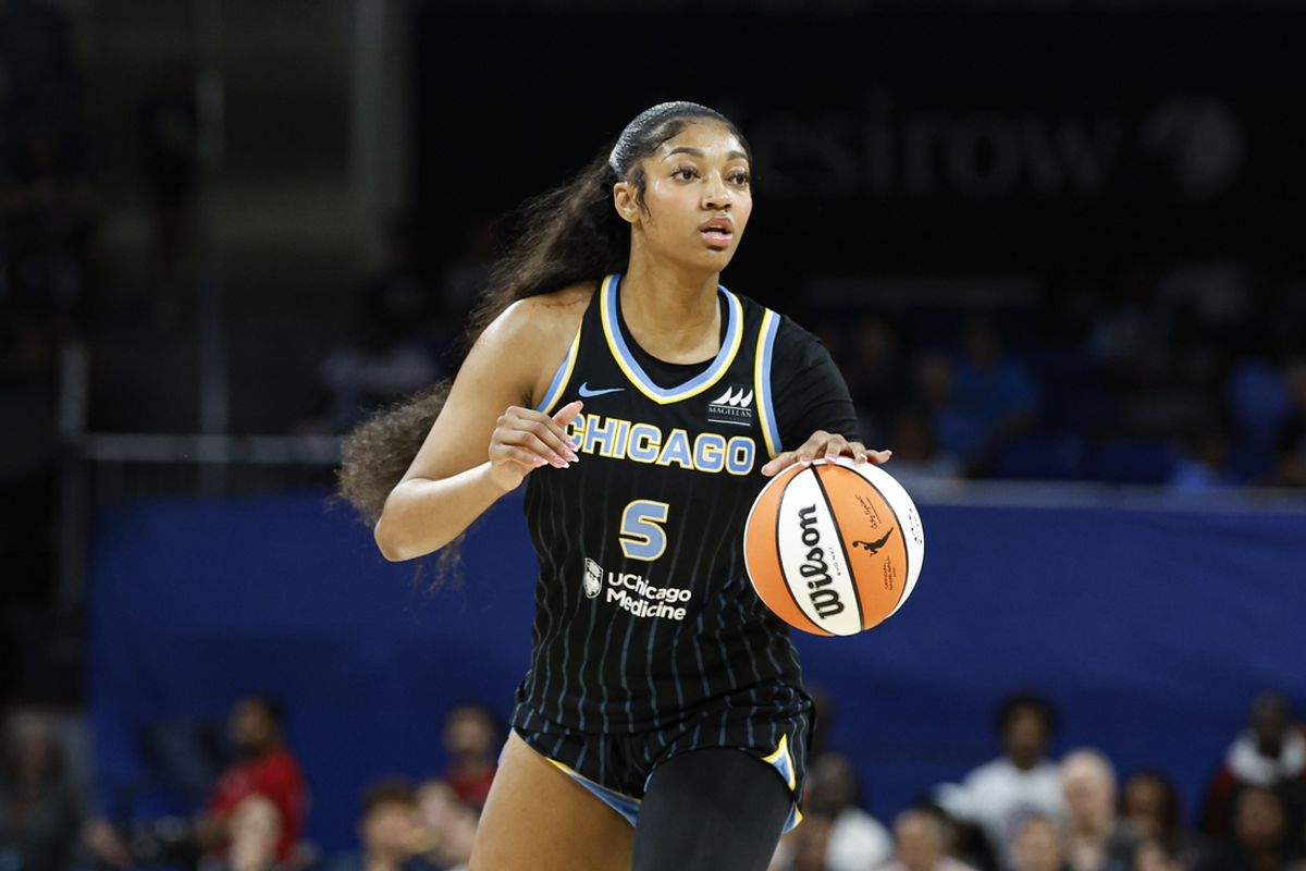 Aug 25, 2024; Chicago, Illinois, USA; Chicago Sky forward Angel Reese (5) looks to pass the ball against the Las Vegas Aces during the first half at Wintrust Arena. Mandatory Credit: Kamil Krzaczynski-USA TODAY Sports