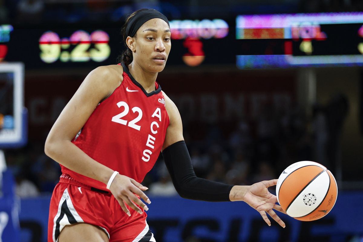 Aug 25, 2024; Chicago, Illinois, USA; Las Vegas Aces center A'ja Wilson (22) passes the ball against the Chicago Sky during the second half at Wintrust Arena. Mandatory Credit: Kamil Krzaczynski-Imagn Images