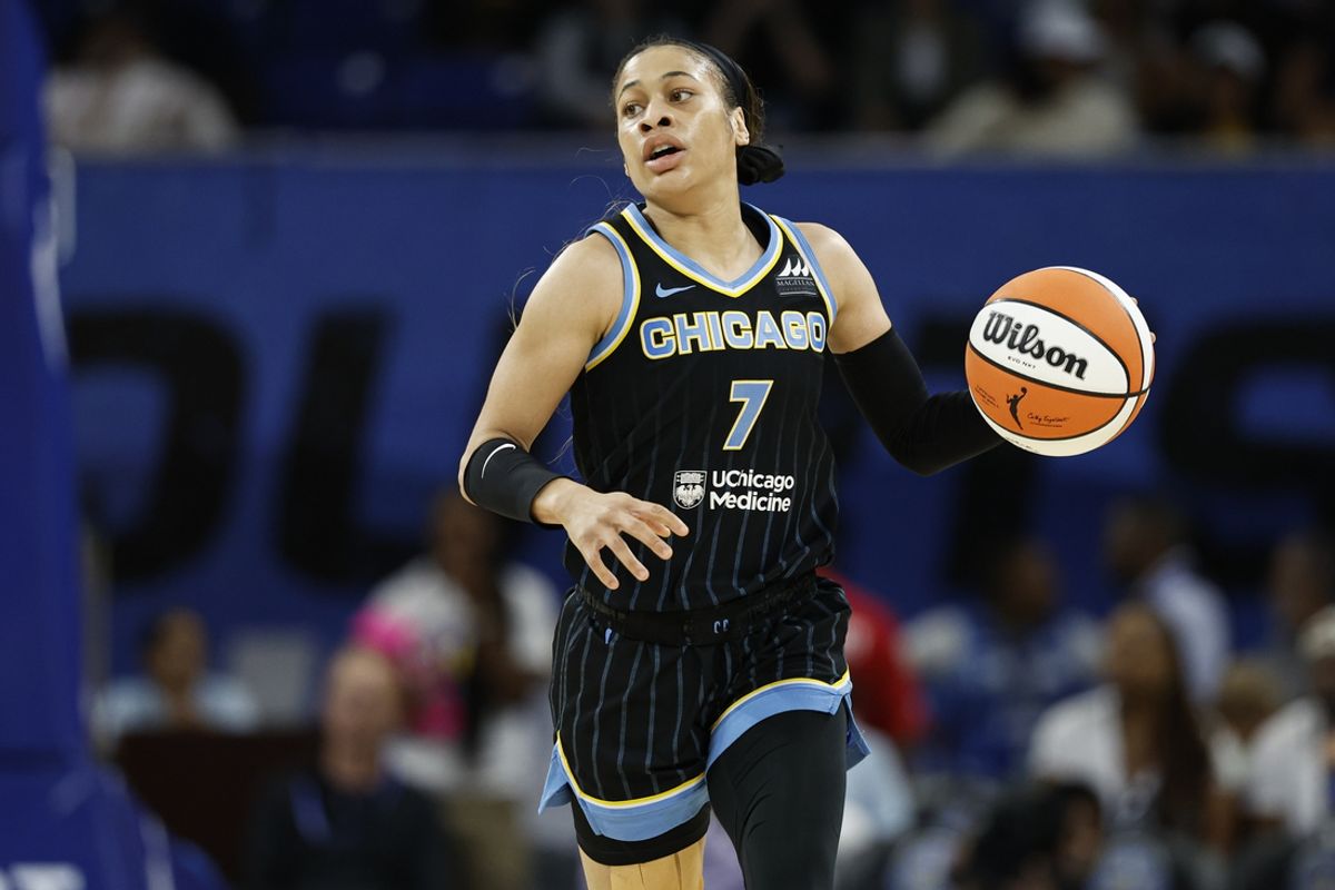 Aug 25, 2024; Chicago, Illinois, USA; Chicago Sky guard Chennedy Carter (7) brings the ball up court against the Las Vegas Aces during the first half at Wintrust Arena. Mandatory Credit: Kamil Krzaczynski-USA TODAY Sports
