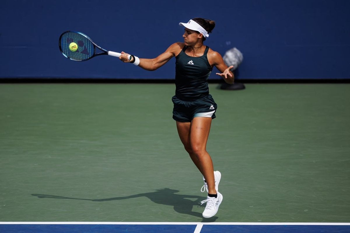 Aug 28, 2024; Flushing, NY, USA; Maria Lourdes Carle in action against Elina Svitolina of Ukraine on Day One of the 2024 U.S. Open tennis tournament at USTA Billie Jean King National Tennis Center. Mandatory Credit: Mike Frey-Imagn Images