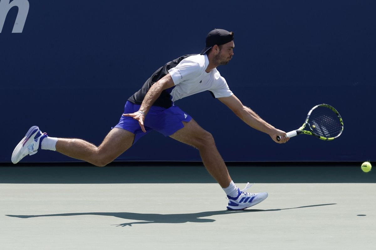 Aug 26, 2024; Flushing, NY, USA; Maximilian Marterer (GER) reaches for a forehand against Alexander Zverev (GER)(not pictured) in a men's singles match on day one of the 2024 U.S. Open tennis tournament at USTA Billie Jean King National Tennis Center. Mandatory Credit: Geoff Burke-Imagn Images