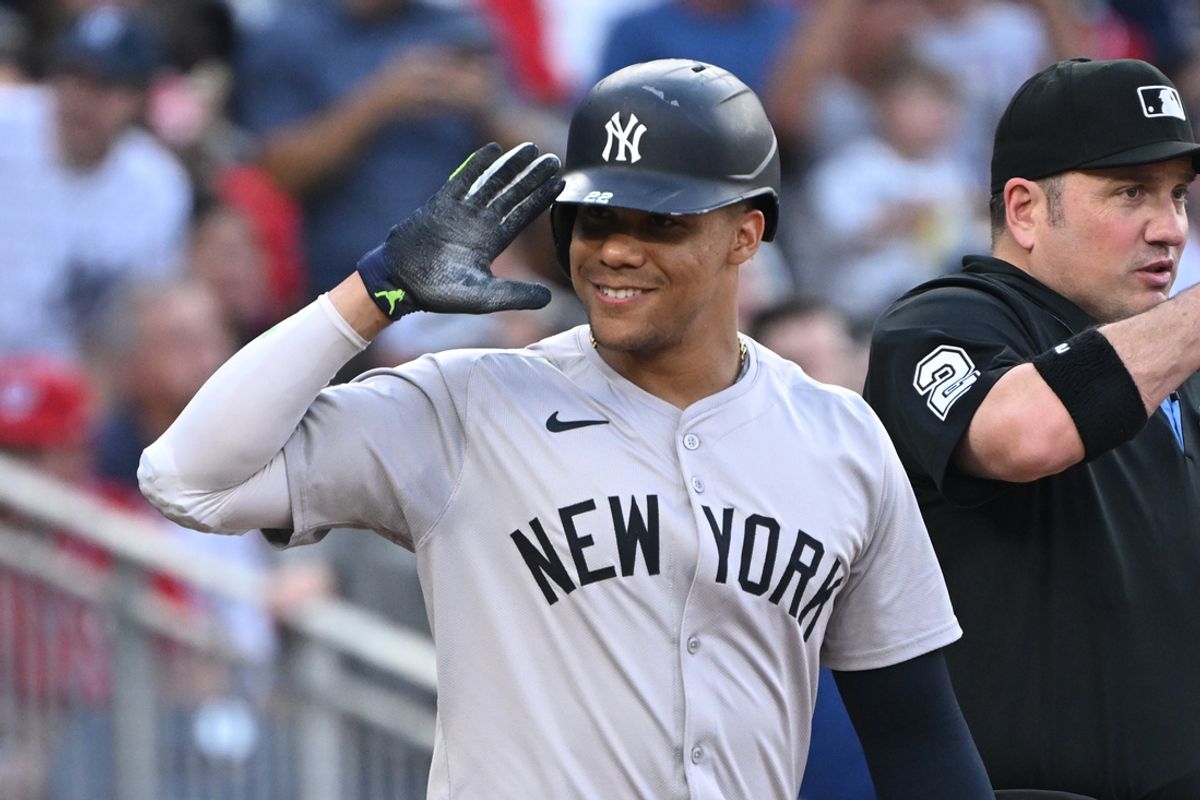 Aug 26, 2024; Washington, District of Columbia, USA; New York Yankees right fielder Juan Soto (22) salutes the Washington Nationals bench before an at bat during the first inning at Nationals Park. Mandatory Credit: Rafael Suanes-USA TODAY Sports
