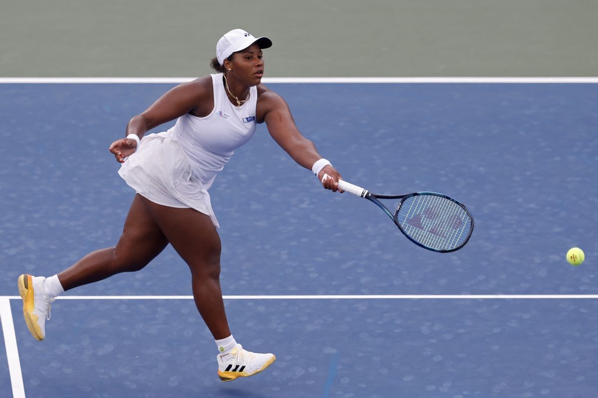 Aug 26, 2024; Flushing, NY, USA; Taylor Townsend (USA) hits a volley against Martina Trevisan (ITA)(not pictured) in a women's singles match on day one of the 2024 U.S. Open tennis tournament at USTA Billie Jean King National Tennis Center. Mandatory Credit: Geoff Burke-Imagn Images