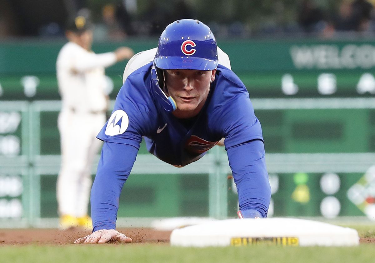 Aug 26, 2024; Pittsburgh, Pennsylvania, USA;  Chicago Cubs center fielder Pete Crow-Armstrong (52) steals third base against the Pittsburgh Pirates during the fourth inning at PNC Park. Mandatory Credit: Charles LeClaire-USA TODAY Sports
