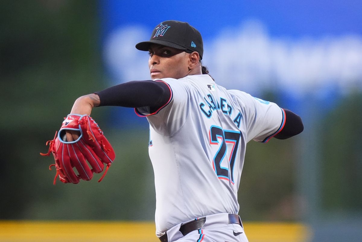 Aug 26, 2024; Denver, Colorado, USA; Miami Marlins starting pitcher Edward Cabrera (27) delivers a pitch in the first inning against the Colorado Rockies at Coors Field. Mandatory Credit: Ron Chenoy-Imagn Images