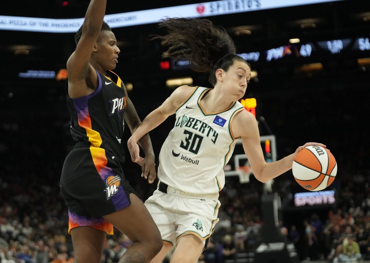 New York Liberty forward Breanna Stewart (30) is defended by Phoenix Mercury forward Natasha Mack (4) during the third quarter at Footprint Center on Aug. 26, 2024, in Phoenix.