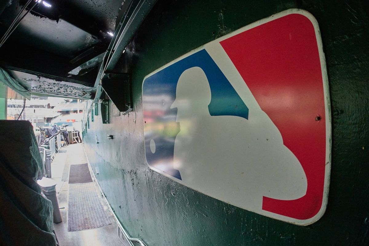 Aug 24, 2024; Oakland, California, USA; The major league baseball logo is seen on signage near the player's entrance to the field at Oakland-Alameda County Coliseum before the game between the Oakland Athletics and the Milwaukee Brewers.  Mandatory Credit: Robert Edwards-Imagn Images