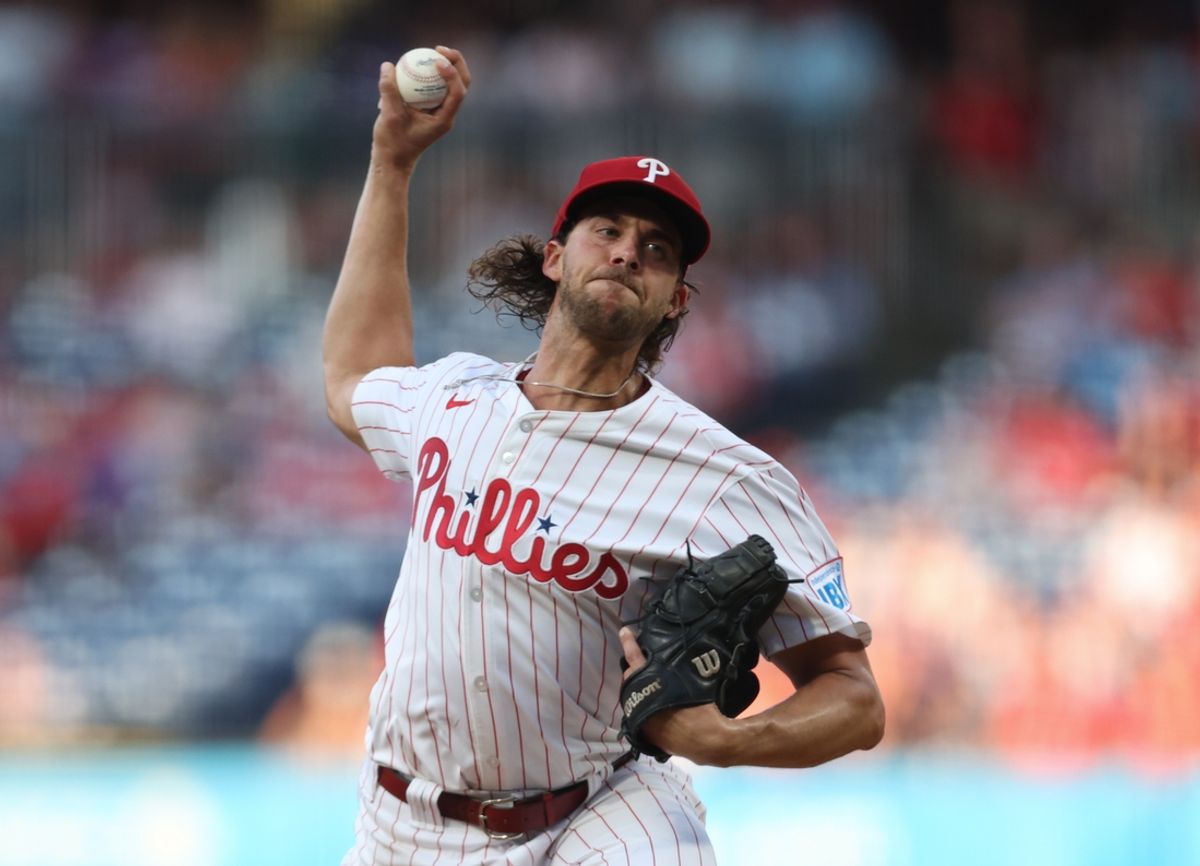 Aug 27, 2024; Philadelphia, Pennsylvania, USA; Philadelphia Phillies pitcher Aaron Nola (27) throws a pitch during the first inning against the Houston Astros at Citizens Bank Park. Mandatory Credit: Bill Streicher-USA TODAY Sports