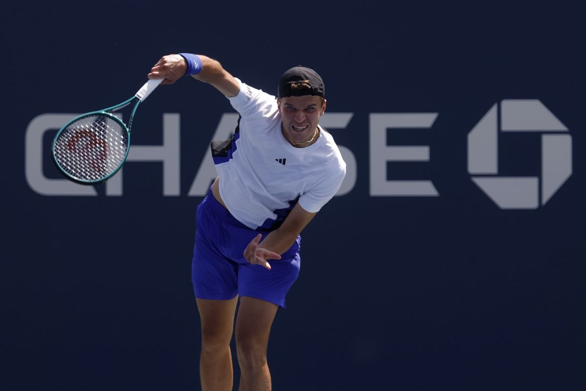 Aug 27, 2024; Flushing, NY, USA; Jakub Mensik (CZE) serves against Felix Auger-Aliassime (CAN)(not pictured) in a men's singles match on day two of the 2024 U.S. Open tennis tournament at USTA Billie Jean King National Tennis Center. Mandatory Credit: Geoff Burke-Imagn Images
