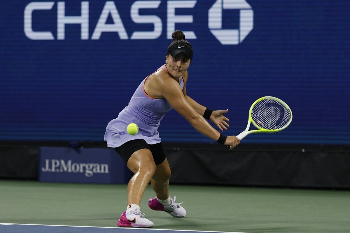 Aug 27, 2024; Flushing, NY, USA; Bianca Andreescu (CAN) reaches for a backhand against Jasmine Paolini (ITA)(not pictured) in a women's singles match on day two of the 2024 U.S. Open tennis tournament at USTA Billie Jean King National Tennis Center. Mandatory Credit: Geoff Burke-Imagn Images