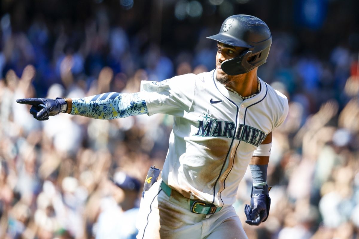 Aug 28, 2024; Seattle, Washington, USA; Seattle Mariners center fielder Julio Rodriguez (44) points back to the dugout after hitting a two-run home run against the Tampa Bay Rays during the fifth inning at T-Mobile Park. Mandatory Credit: Joe Nicholson-USA TODAY Sports