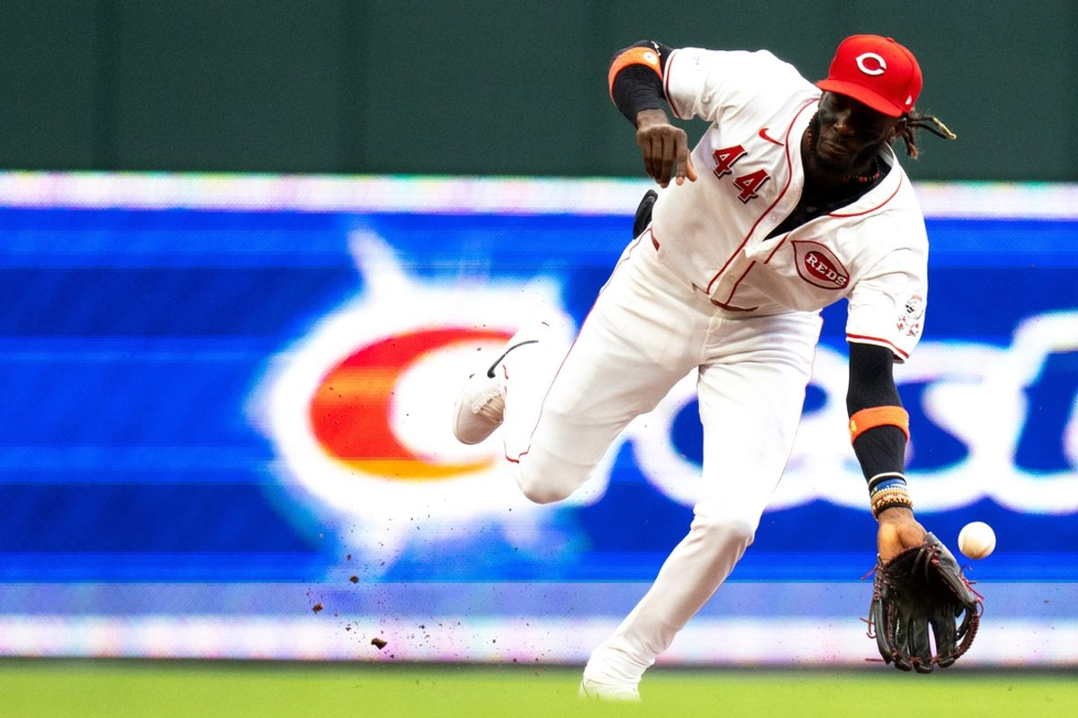 Cincinnati Reds shortstop Elly De La Cruz (44) mishandles a ground ball in the second inning of the MLB game between the Cincinnati Reds and Oakland Athletics at Great American Ball Park in Cincinnati on Wednesday, Aug. 28, 2024.