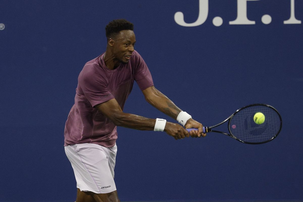 Aug 28, 2024; Flushing, NY, USA; Gael Monfils (FRA) hits a backhand against Casper Ruud (NOR)(not pictured) in a men's singles match on day three of the U.S. Open tennis tournament at USTA Billie Jean King National Tennis Center. Mandatory Credit: Geoff Burke-Imagn Images