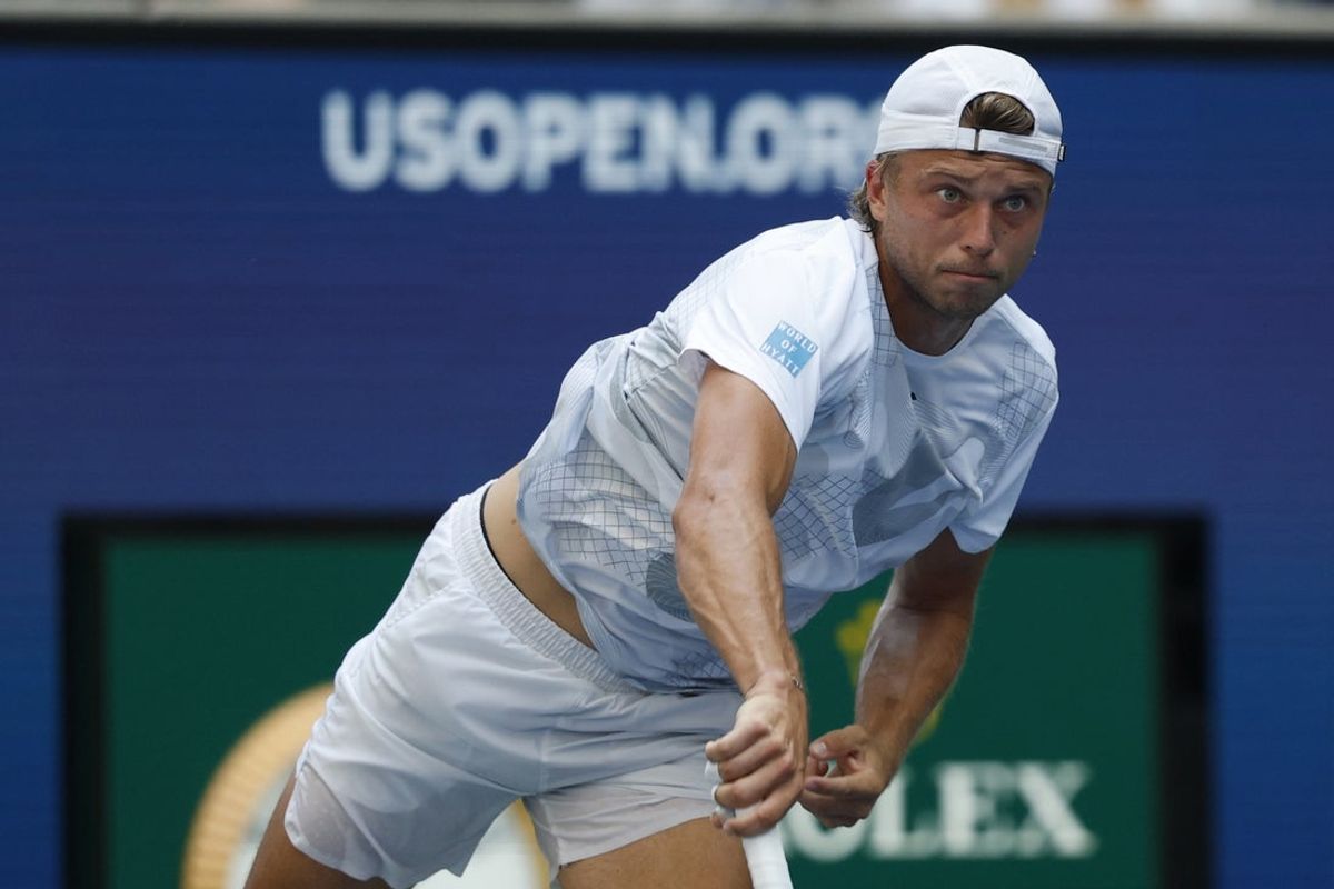 Aug 28, 2024; Flushing, NY, USA; Alexandre Muller (FRA) serves against Alexander Zverev (GER)(not pictured) in a men's singles match on day three of the U.S. Open tennis tournament at USTA Billie Jean King National Tennis Center. Mandatory Credit: Geoff Burke-Imagn Images