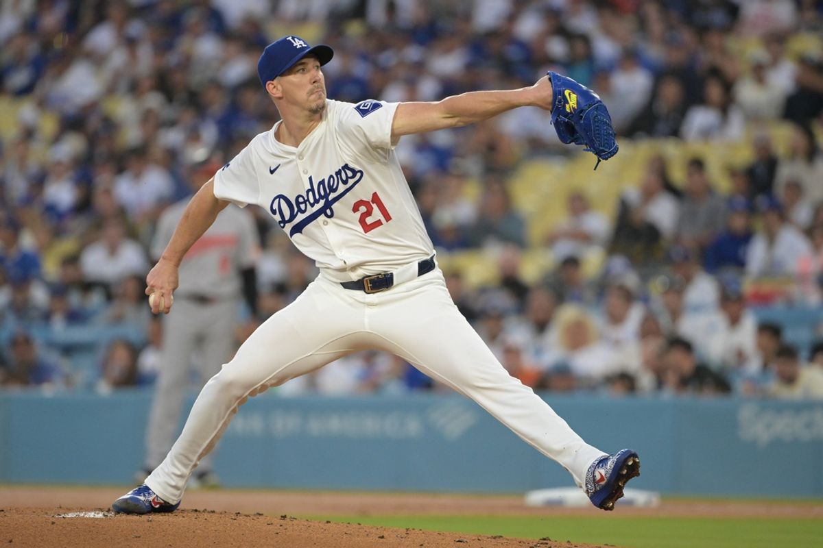 Aug 28, 2024; Los Angeles, California, USA;  Los Angeles Dodgers starting pitcher Walker Buehler (21) delivers to the plate in the first inning against the Baltimore Orioles at Dodger Stadium. Mandatory Credit: Jayne Kamin-Oncea-Imagn Images