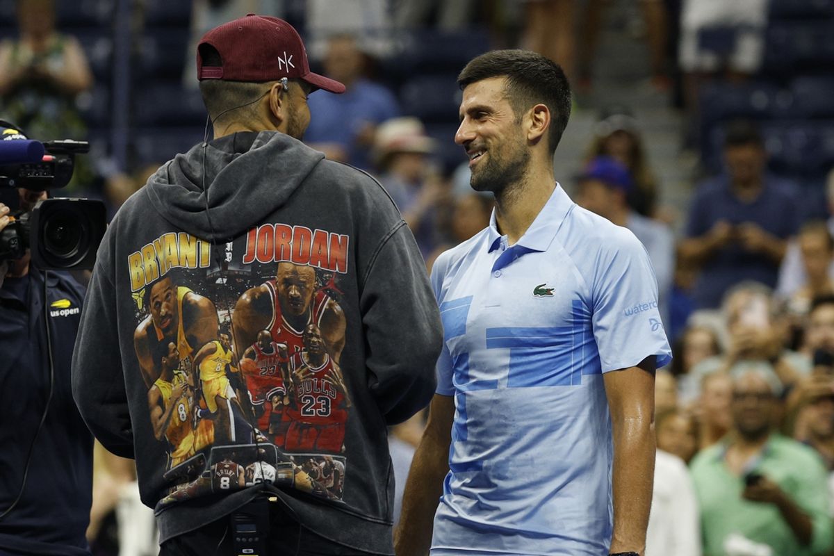 Aug 28, 2024; Flushing, NY, USA; Novak Djokovic (SRB)(R) talks with on-court interviewer Nick Kyrgios (L) after his match against Laslo Djere (SRB)(not pictured) in a men's singles match on day three of the U.S. Open tennis tournament at USTA Billie Jean King National Tennis Center. Mandatory Credit: Geoff Burke-Imagn Images