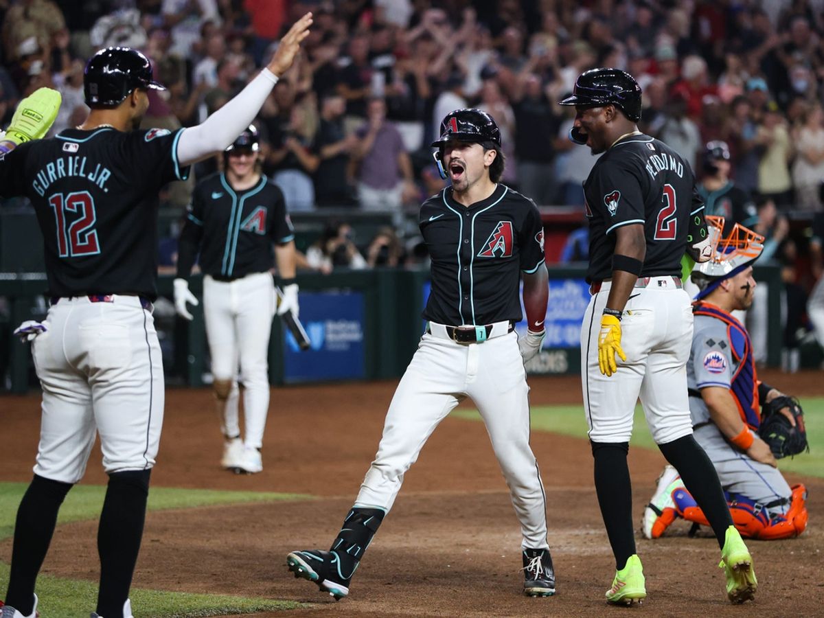 Arizona Diamondbacks outfielder Corbin Carroll (7) celebrates after hitting a grand slam in the eighth inning to take the lead 8-5 on Aug. 28, 2024 at Chase Field in Phoenix.