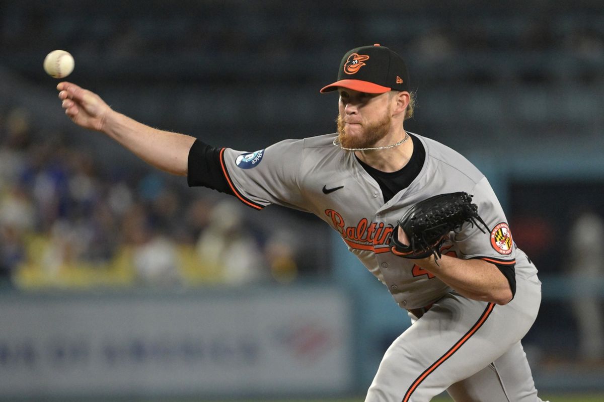 Aug 28, 2024; Los Angeles, California, USA;  Baltimore Orioles relief pitcher Craig Kimbrel (46) delivers to the plate in the eighth inning against the Los Angeles Dodgers at Dodger Stadium. Mandatory Credit: Jayne Kamin-Oncea-Imagn Images