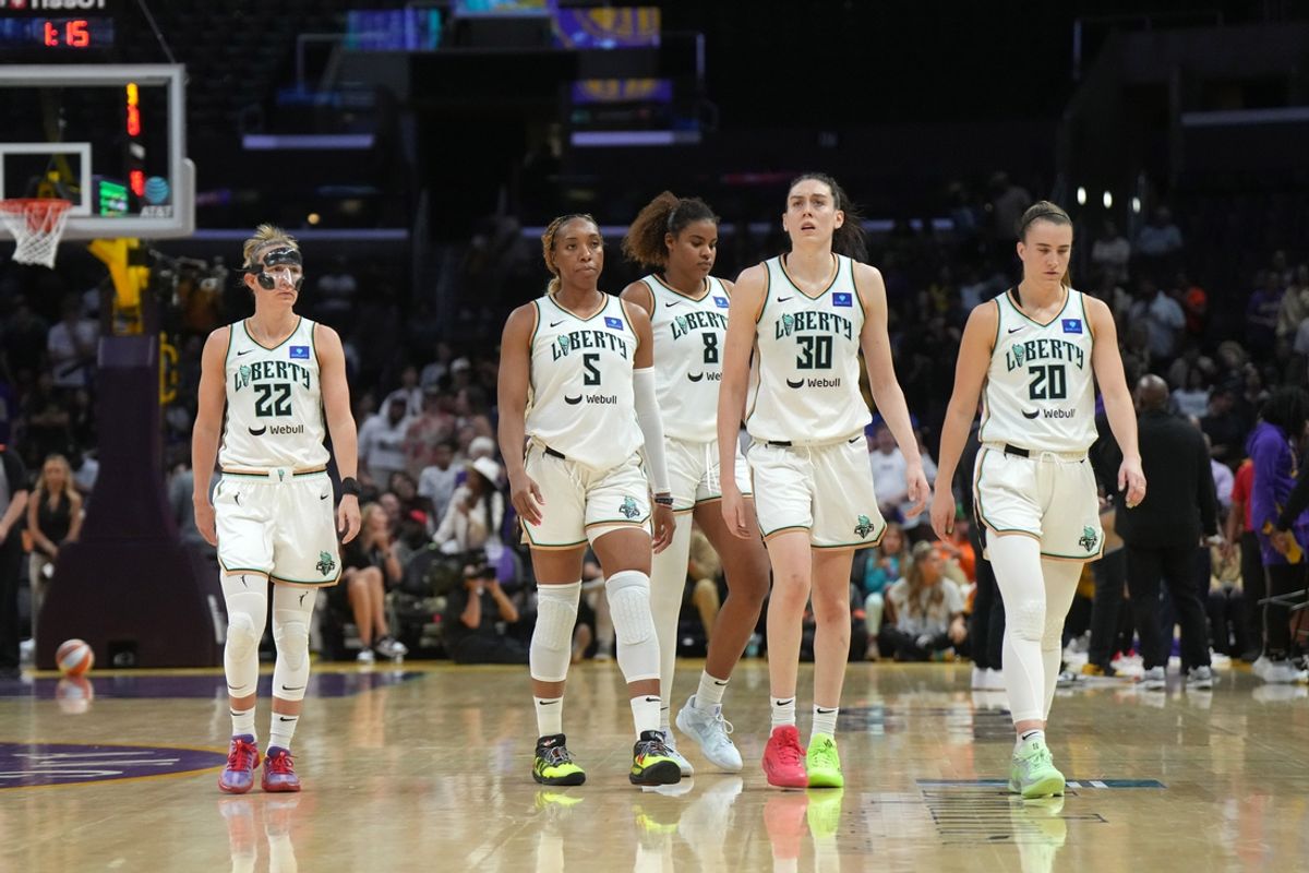Aug 28, 2024; Los Angeles, California, USA; New York Liberty guard Courtney Vandersloot (22), forward Kayla Thornton (5), forward Nyara Sabally (8), forward Breanna Stewart (30) and guard Sabrina Ionescu (20) react against the LA Sparks in the second half at Crypto.com Arena. Mandatory Credit: Kirby Lee-Imagn Images