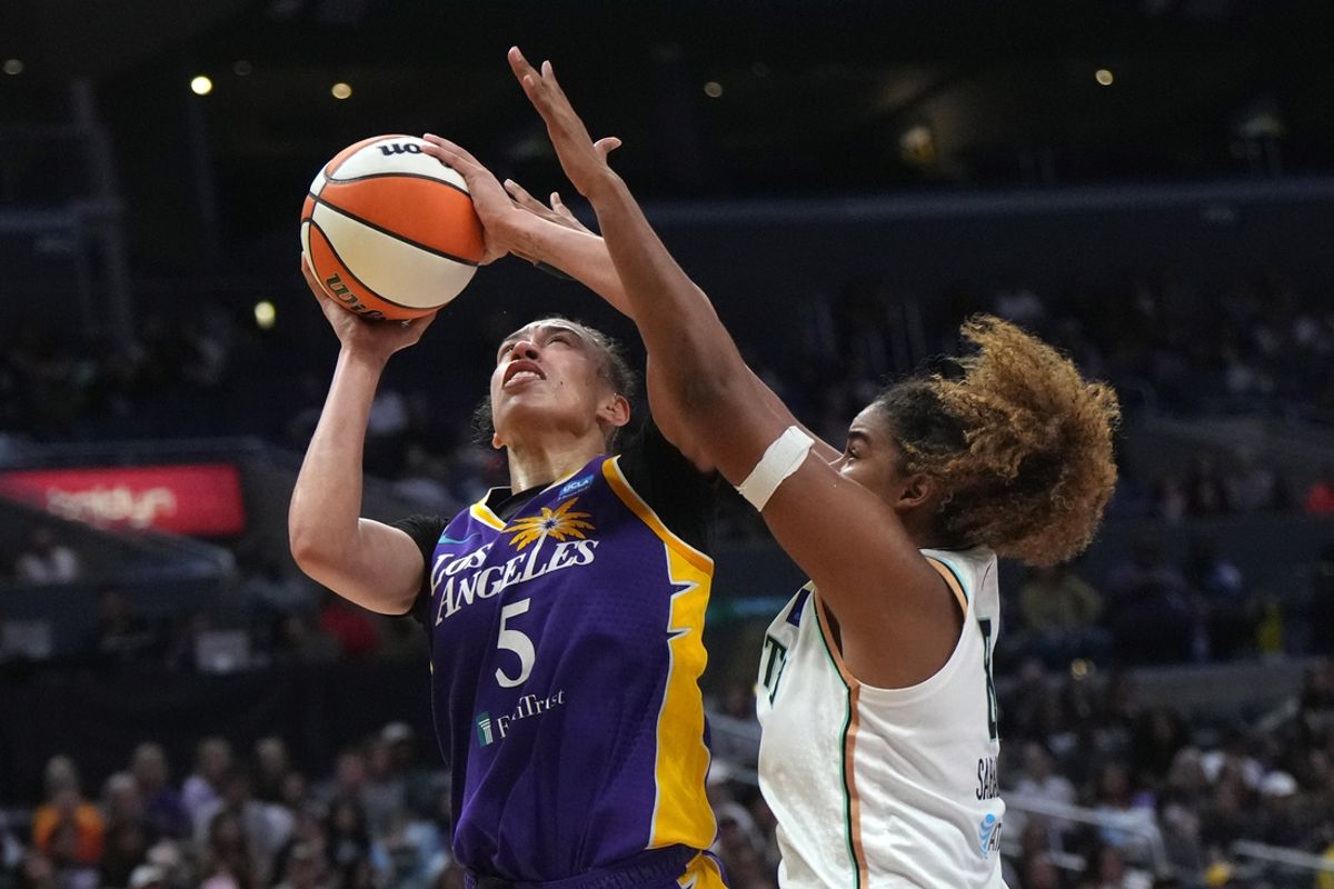 Aug 28, 2024; Los Angeles, California, USA; LA Sparks forward Dearica Hamby (5) shoots the ball against New York Liberty forward Nyara Sabally (8) in the second half at Crypto.com Arena. Mandatory Credit: Kirby Lee-USA TODAY Sports